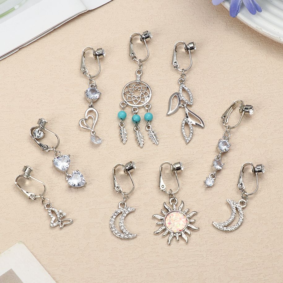 Faux Fake Belly Star Fake Bell - Body Jewelry Earrings recension och pris